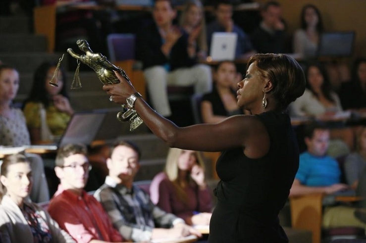 Annalise Keating (Viola Davis) holding the weekly prize/eventual murder weapon. 