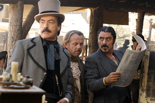Cy (Powers Boothe), EB (William Sanderson), Al (Ian McShane) and the much fretted over plague article. 